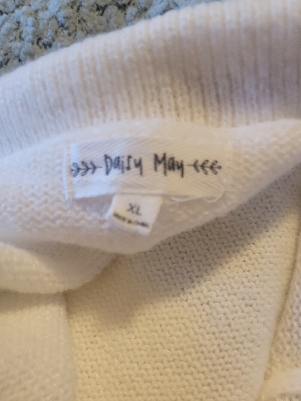 Daisy White Zip-Up Knit Bomber with Pink Bow Details - Picture 6 of 7